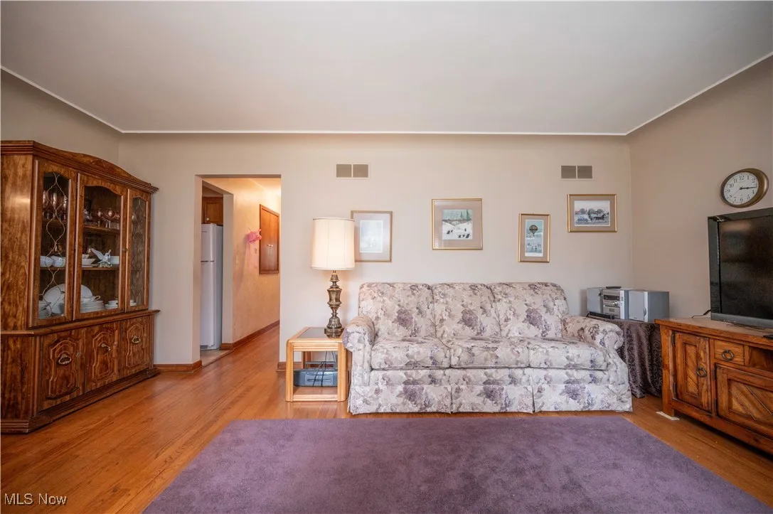 Living area with wood finished floors