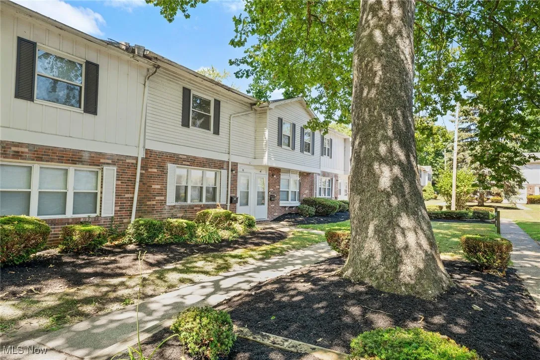 View of front of home with brick siding