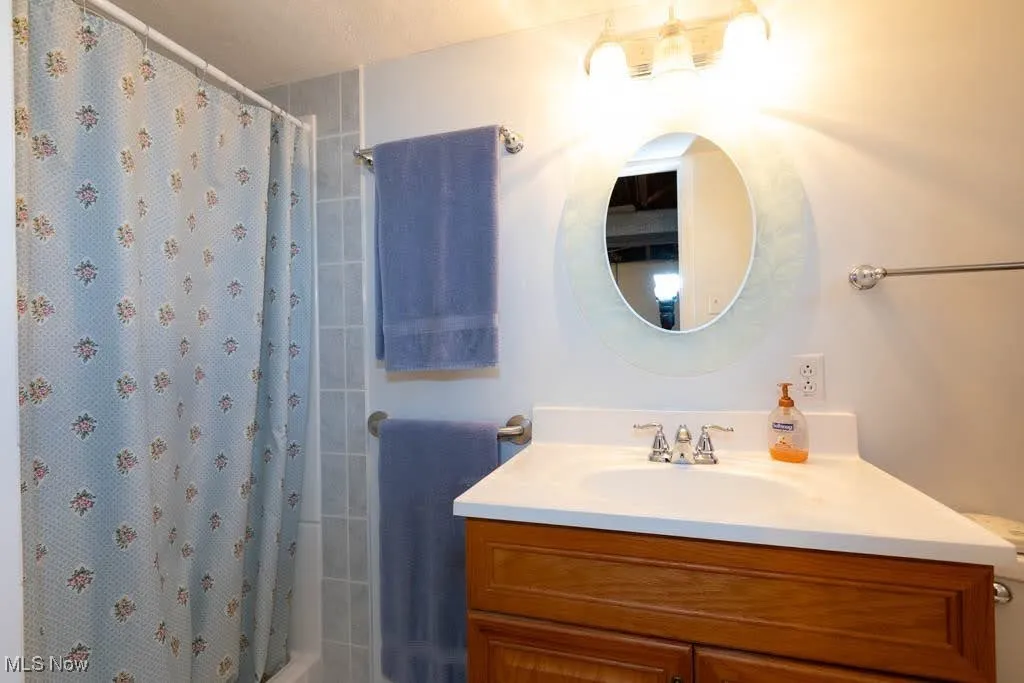 Bathroom with vanity IN LOWER LEVEL