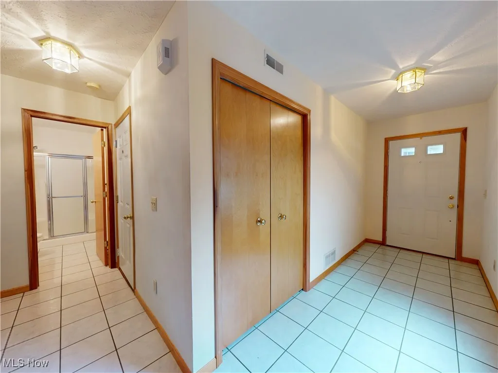 First floor foyer and bath