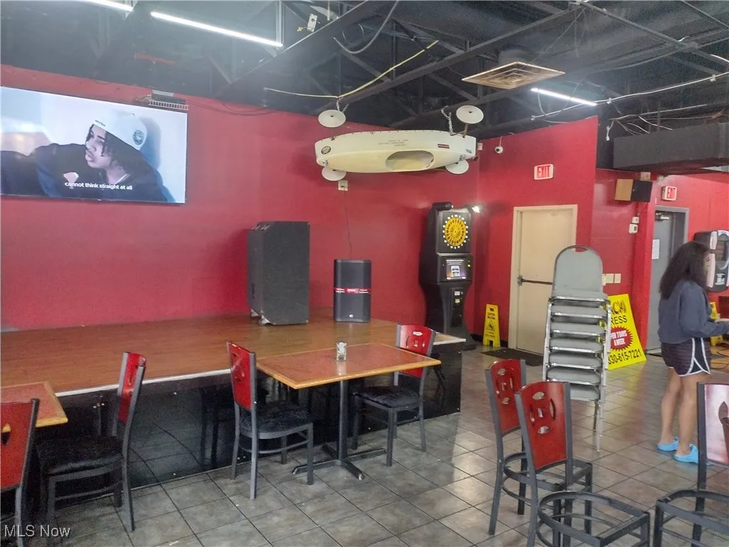 Dining area with tile patterned flooring