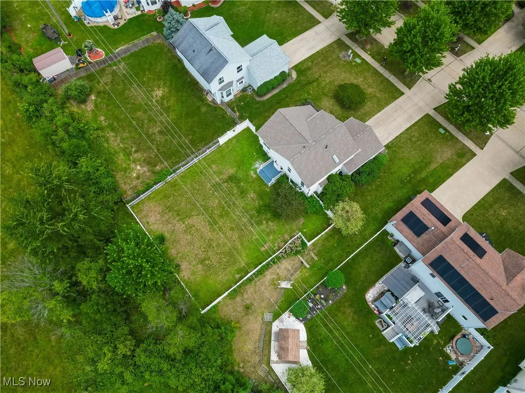 Notice The Large Deck & The fenced in backyard!