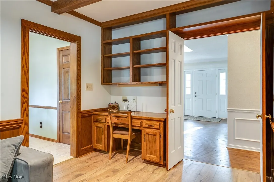 Family Room with built in desk and shelving