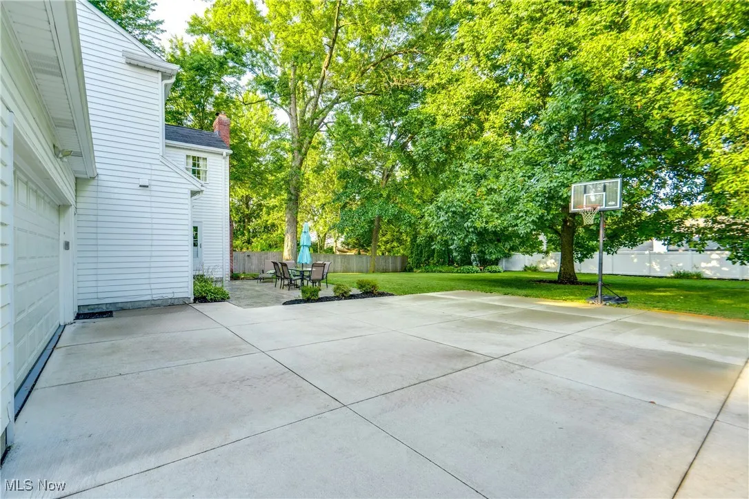 Fenced backyard featuring a patio