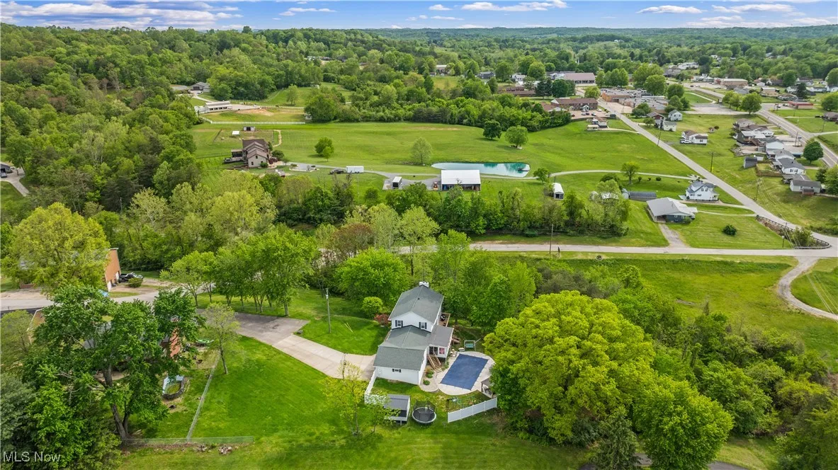 View of property location featuring a heavily wooded area