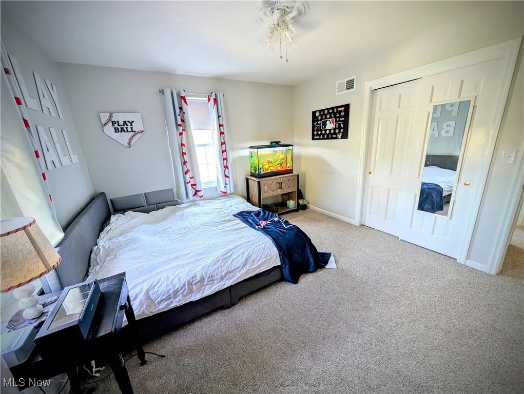 Bedroom with carpet flooring