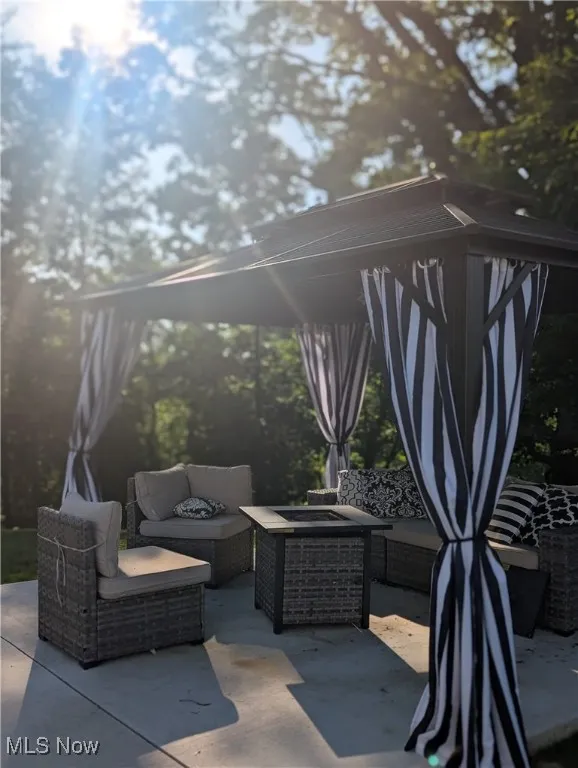 View of patio featuring outdoor lounge area