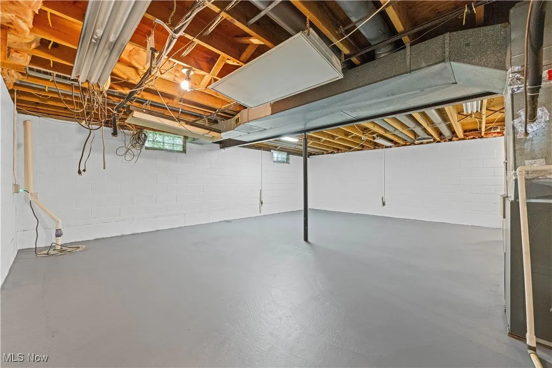 Below grade area with lifetime guarantee and waterproofing done by Pioneer.
