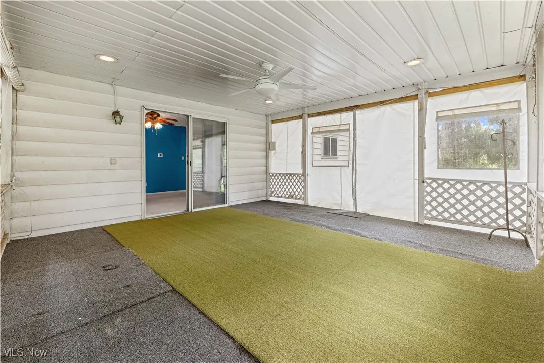 Covered patio/porch with view of family room