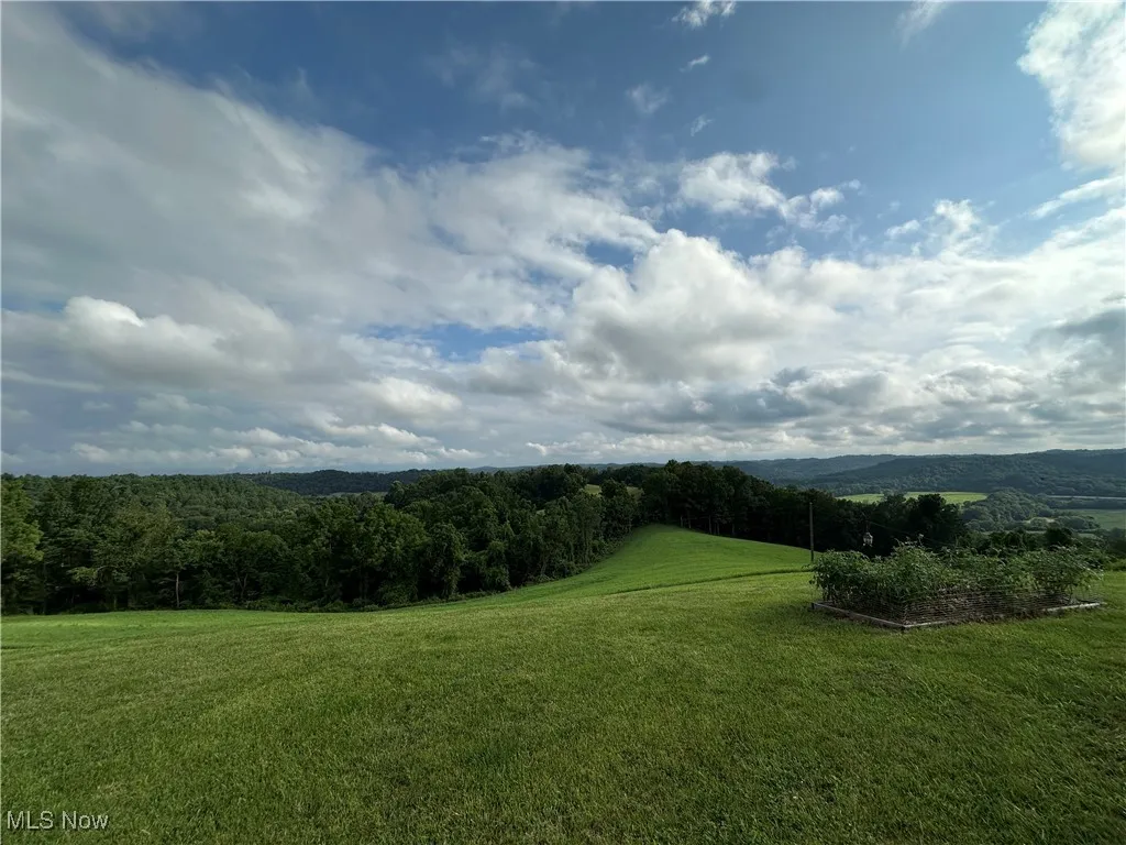 View of mountain background with a forest and rural landscape