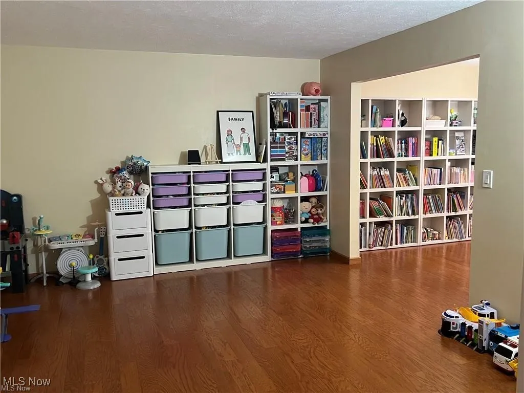 Misc room featuring wood finished floors