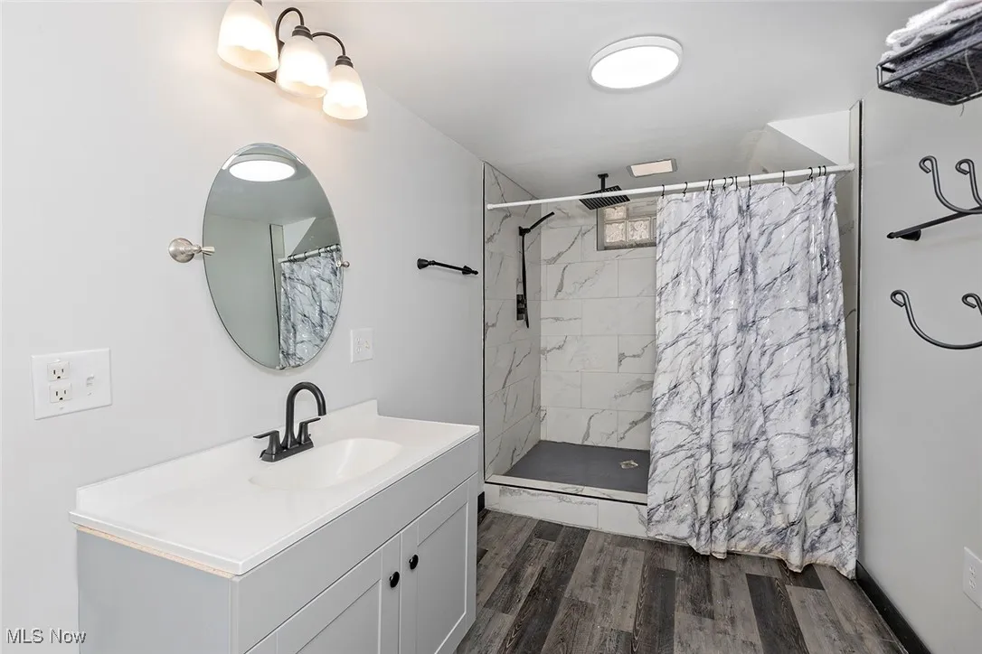 Basement includes a newer full bath with large shower