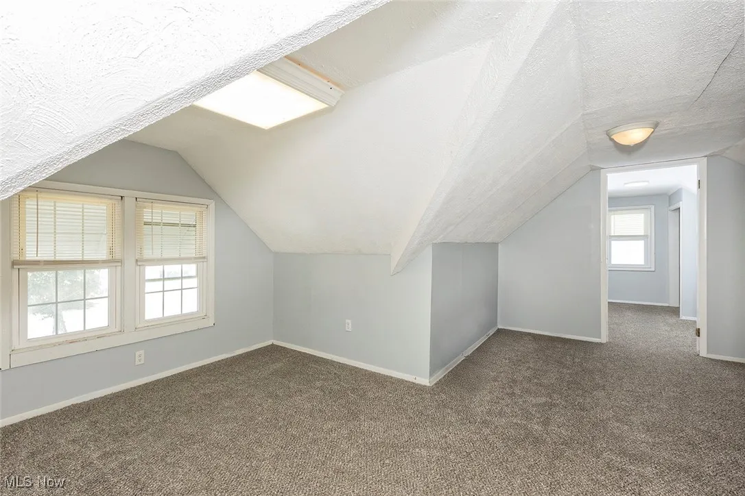 Second floor is completely finished with a bedroom and bonus room or tandem bedroom.