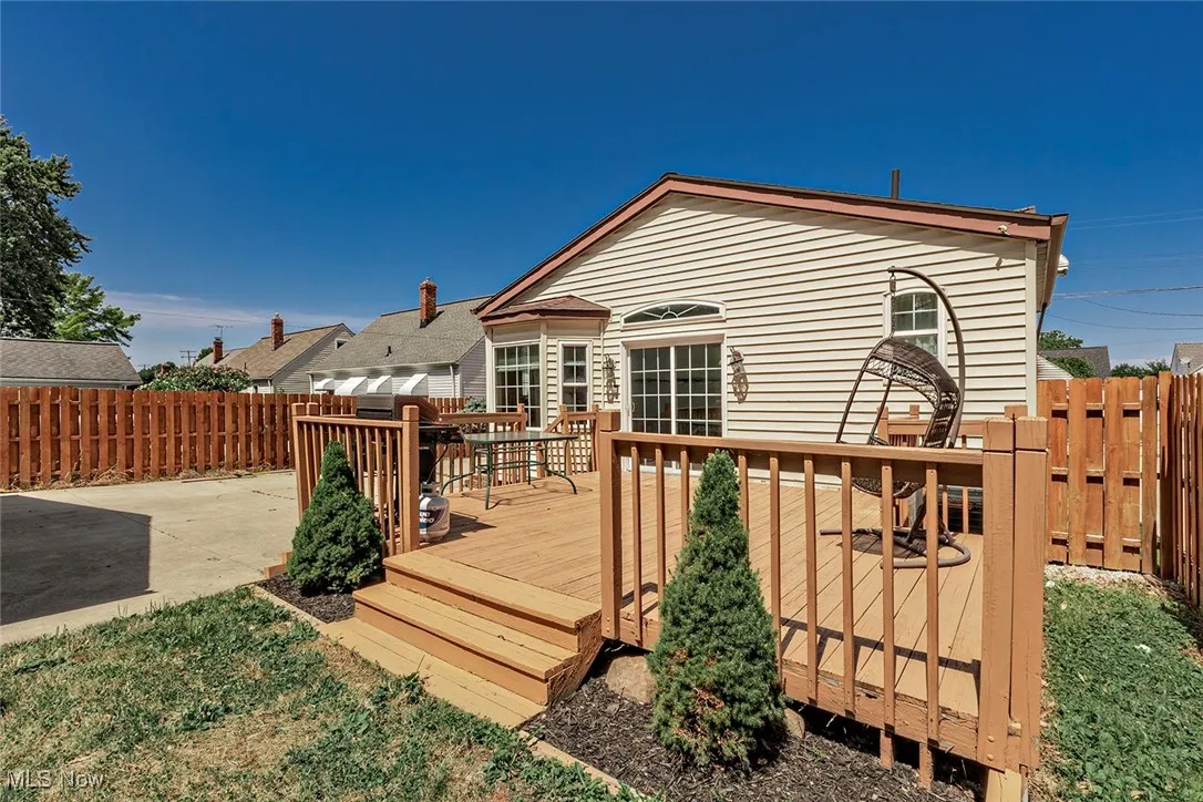 Rear deck is accessed off the Family Room sliding glass doors.
