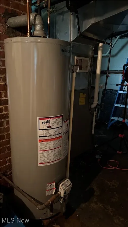 Utility room with gas water heater