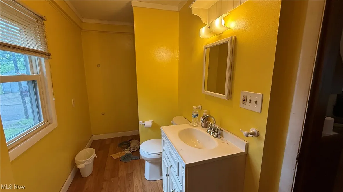 Half bath on main level with washer dryer hookup. Easy to make back into full bath.