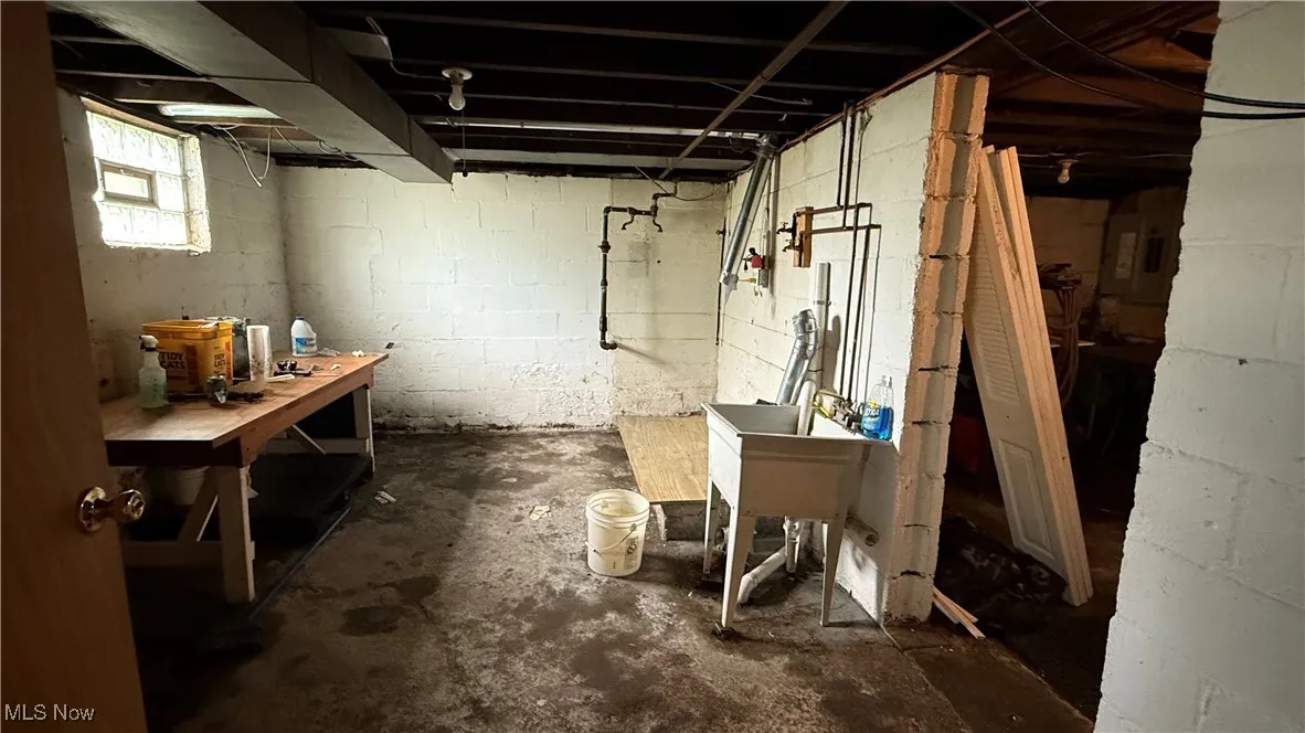 Below grade area with a workshop area
