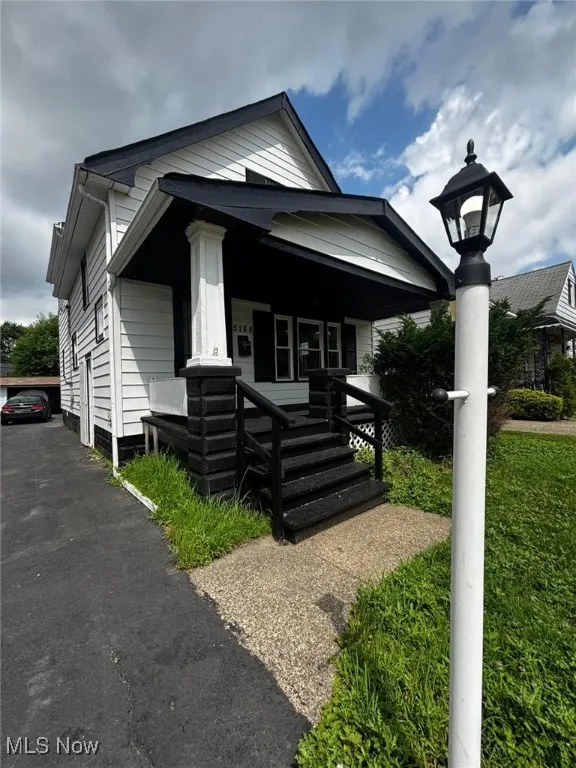 Bungalow-style home with a porch