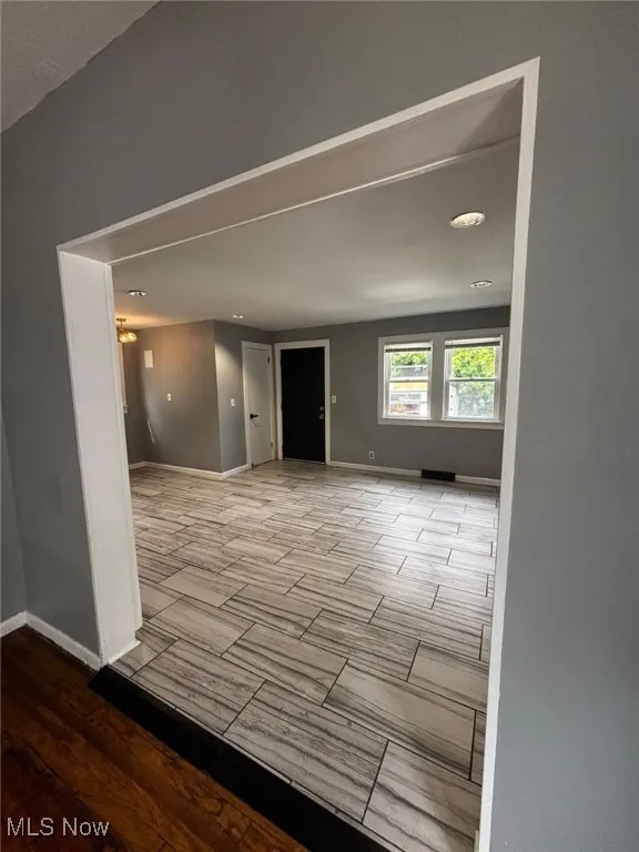 Unfurnished room featuring recessed lighting