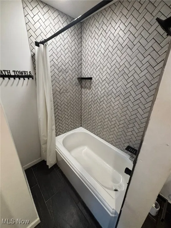 Bathroom with shower / tub combo