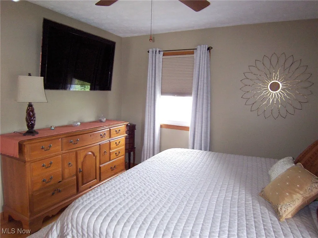Bedroom featuring a ceiling fan