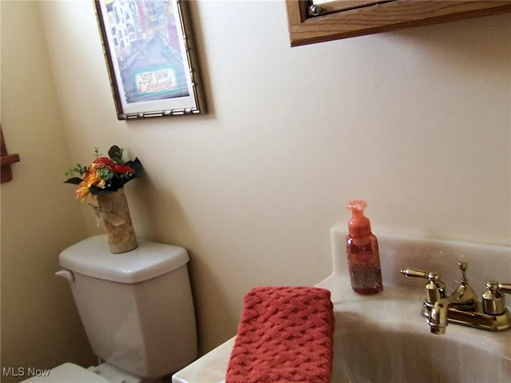 Bathroom with toilet and a sink