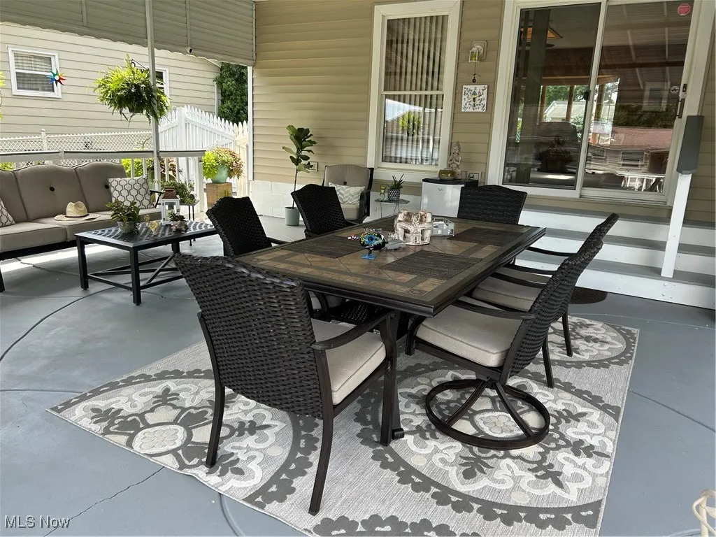 View of patio featuring outdoor lounge area and outdoor dining area