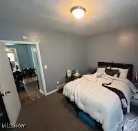 Bedroom with baseboards