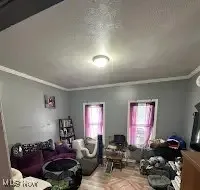 Living area with crown molding