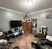 Living area with crown molding