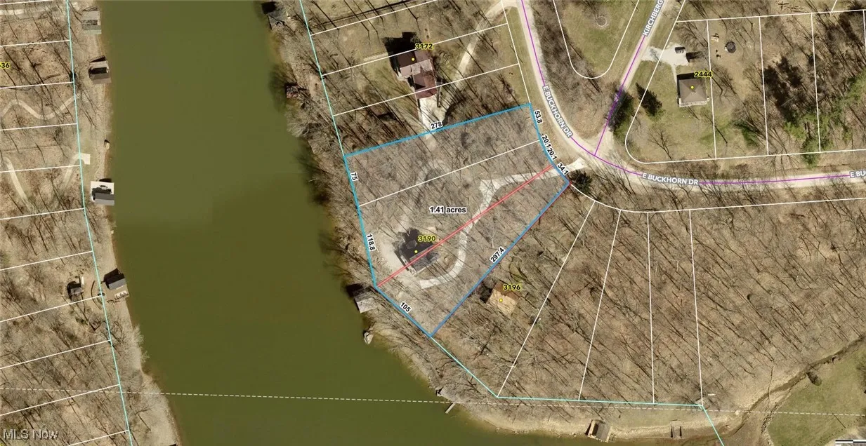Aerial map of property and surrounding area featuring property boundaries highlighted