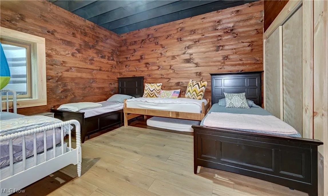 Basement Bedroom with wood finished floors