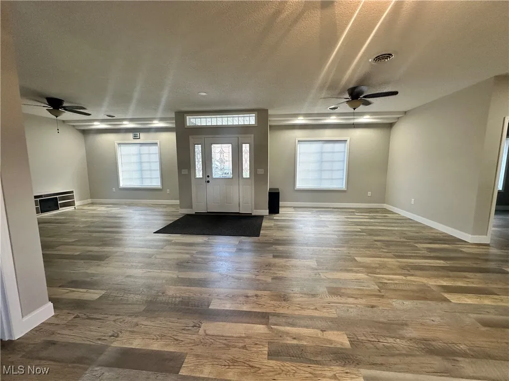 Front door into Open Living room/dining area