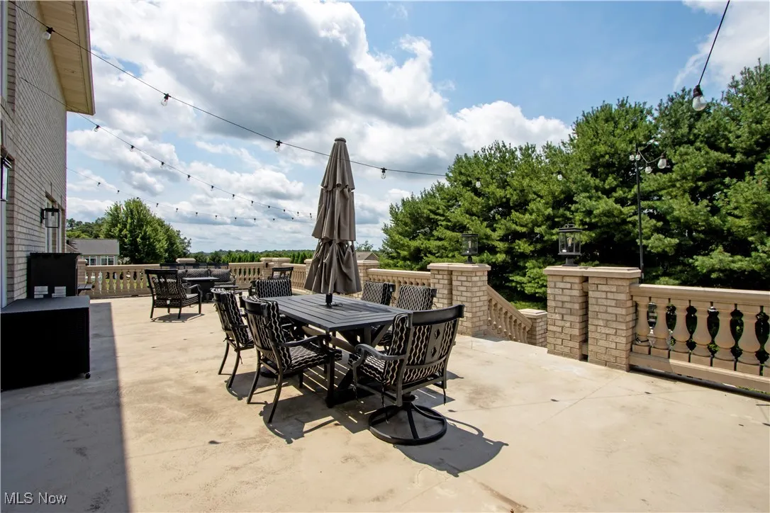 View of  upper patio with outdoor dining space