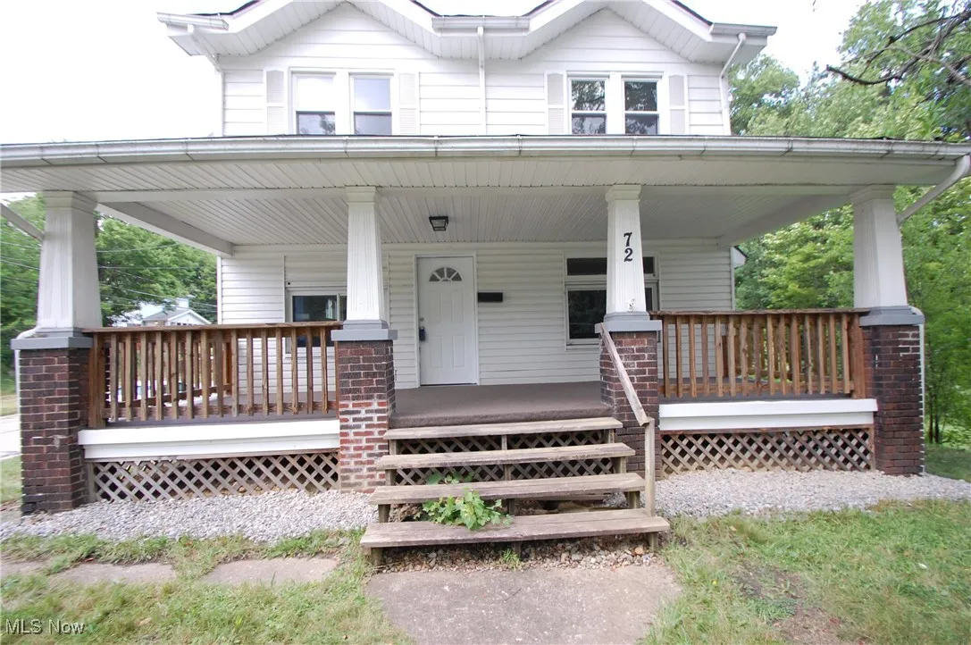 View of front of property with covered porch