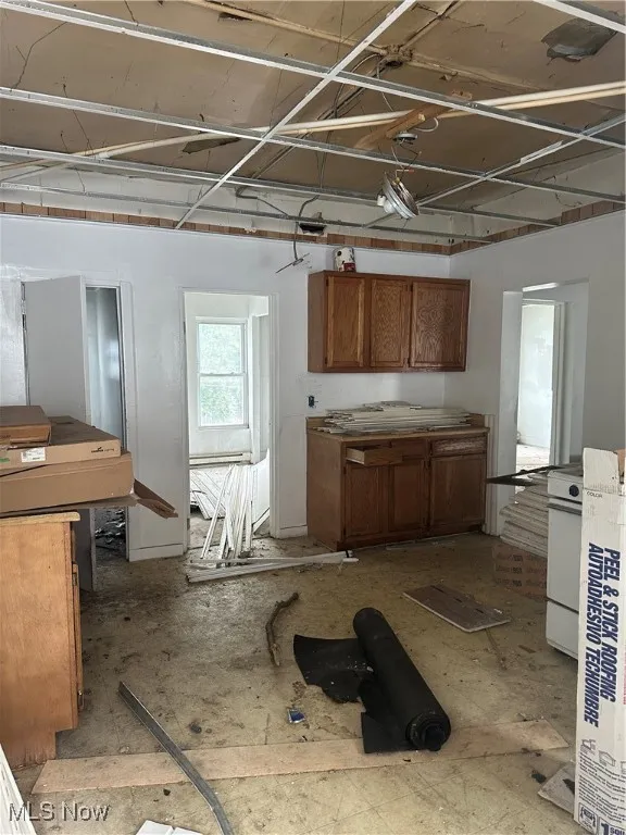 Kitchen with brown cabinetry
