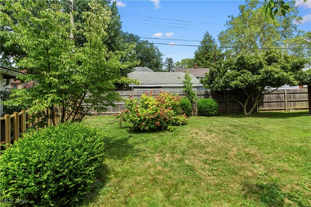 View of fenced backyard