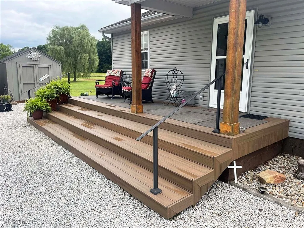 Deck with a storage unit