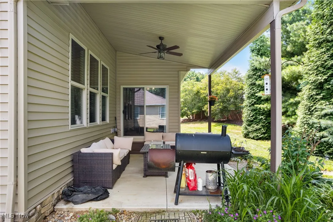 View of patio / terrace featuring outdoor lounge area, a ceiling fan, and grilling area