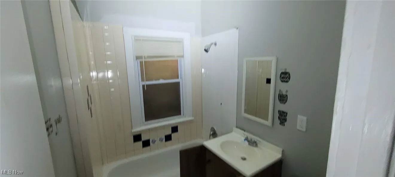 Full bath with vanity