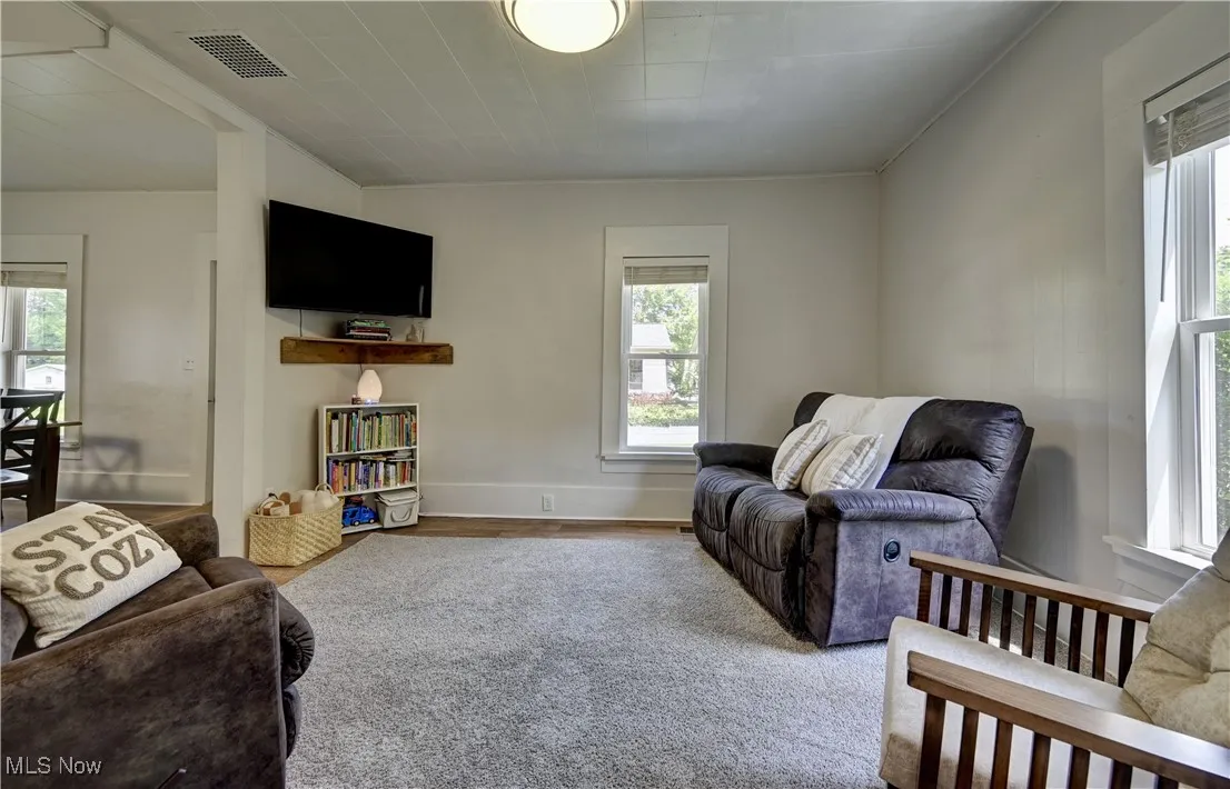 Living room featuring plenty of natural light