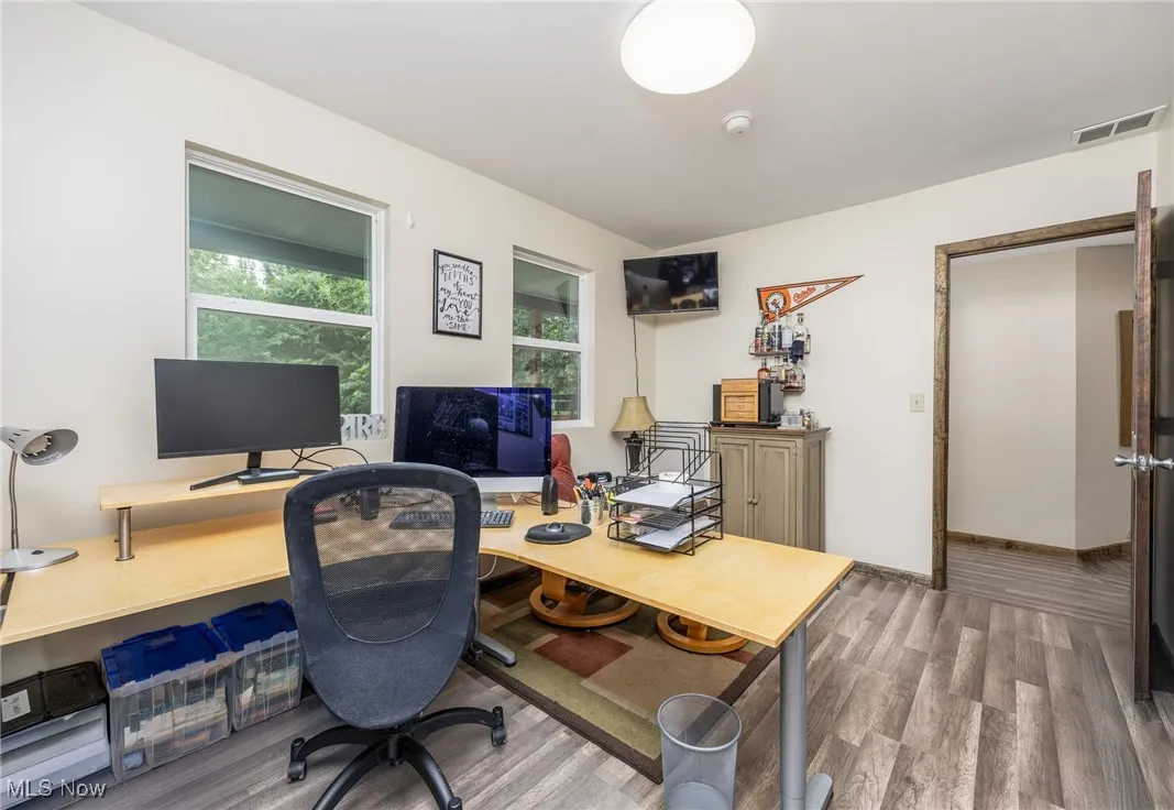 Office featuring wood finished floors