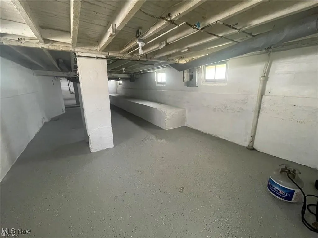 Below grade area with electric panel