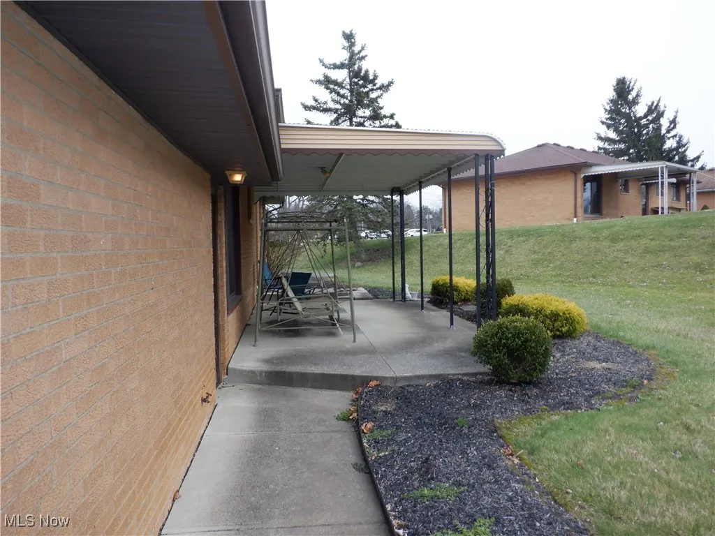 a view of patio, in the back yard