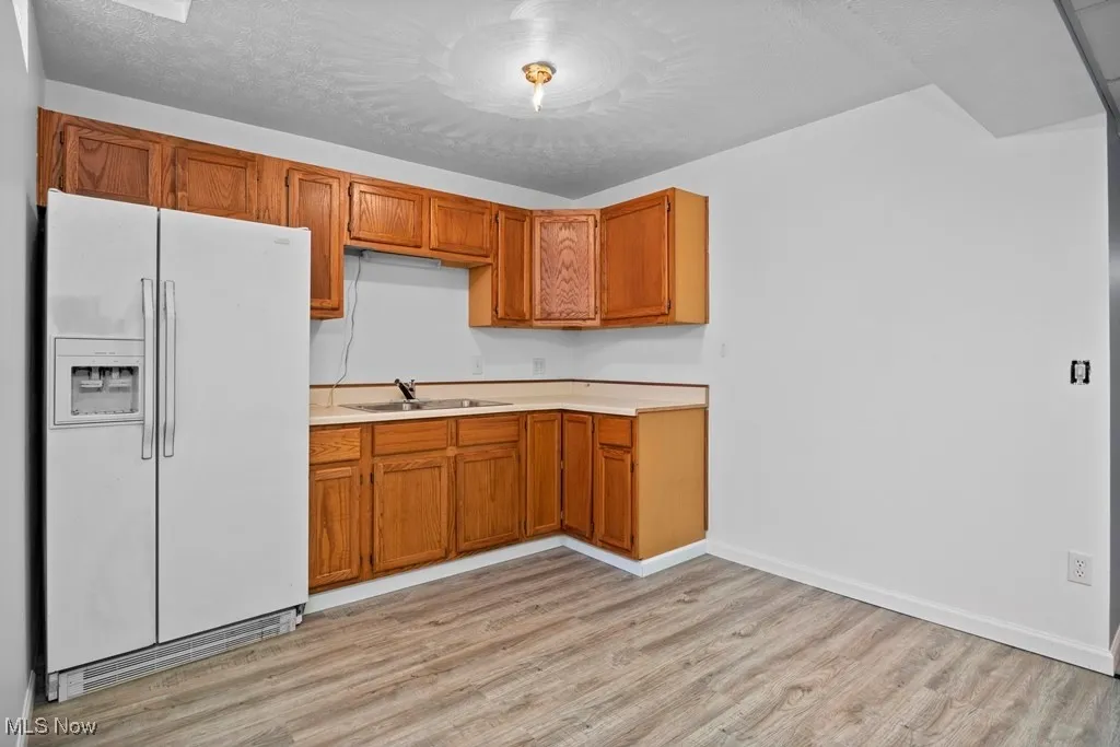 partial kitchen in basement