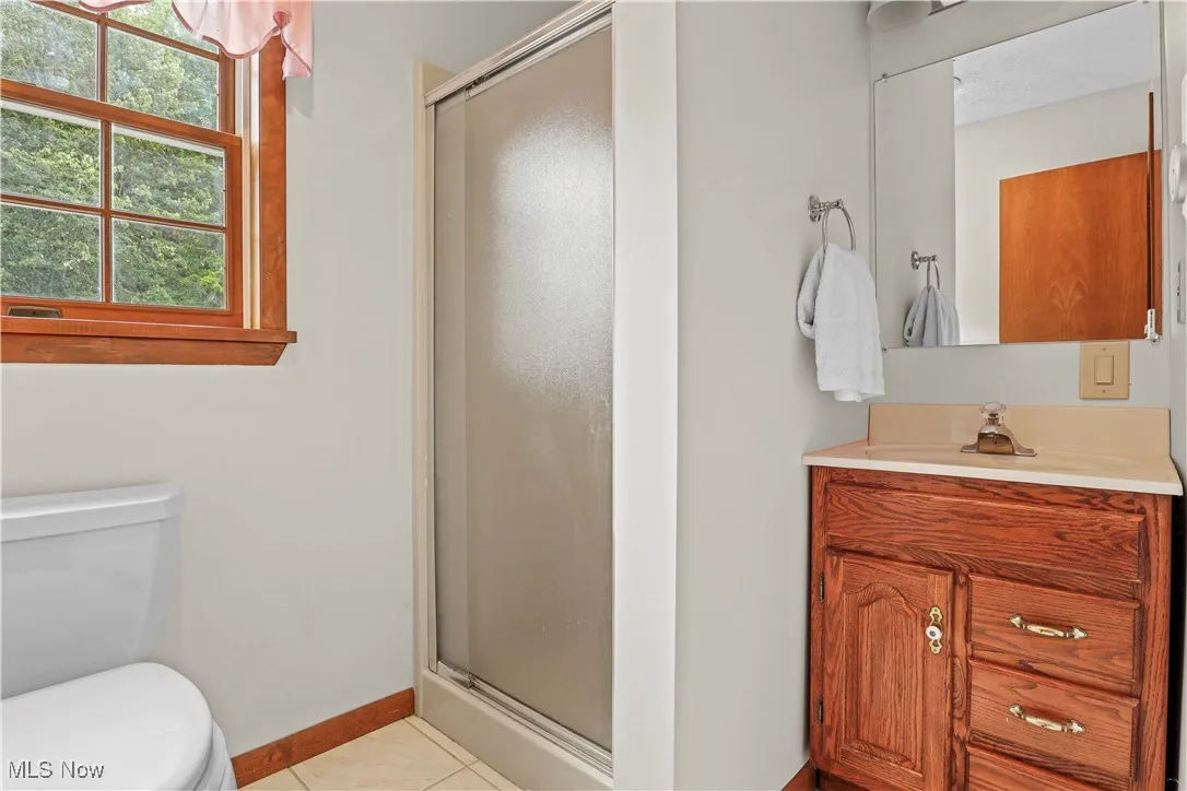 Second Full Bathroom off the Master suite with a walk in shower.