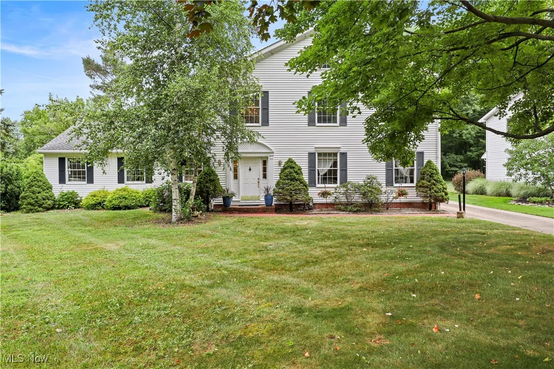 View of front of house with a front yard