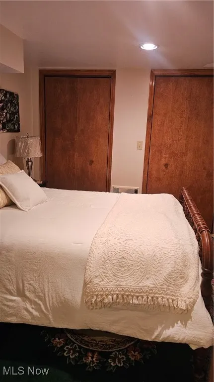 Bedroom featuring a closet and recessed lighting