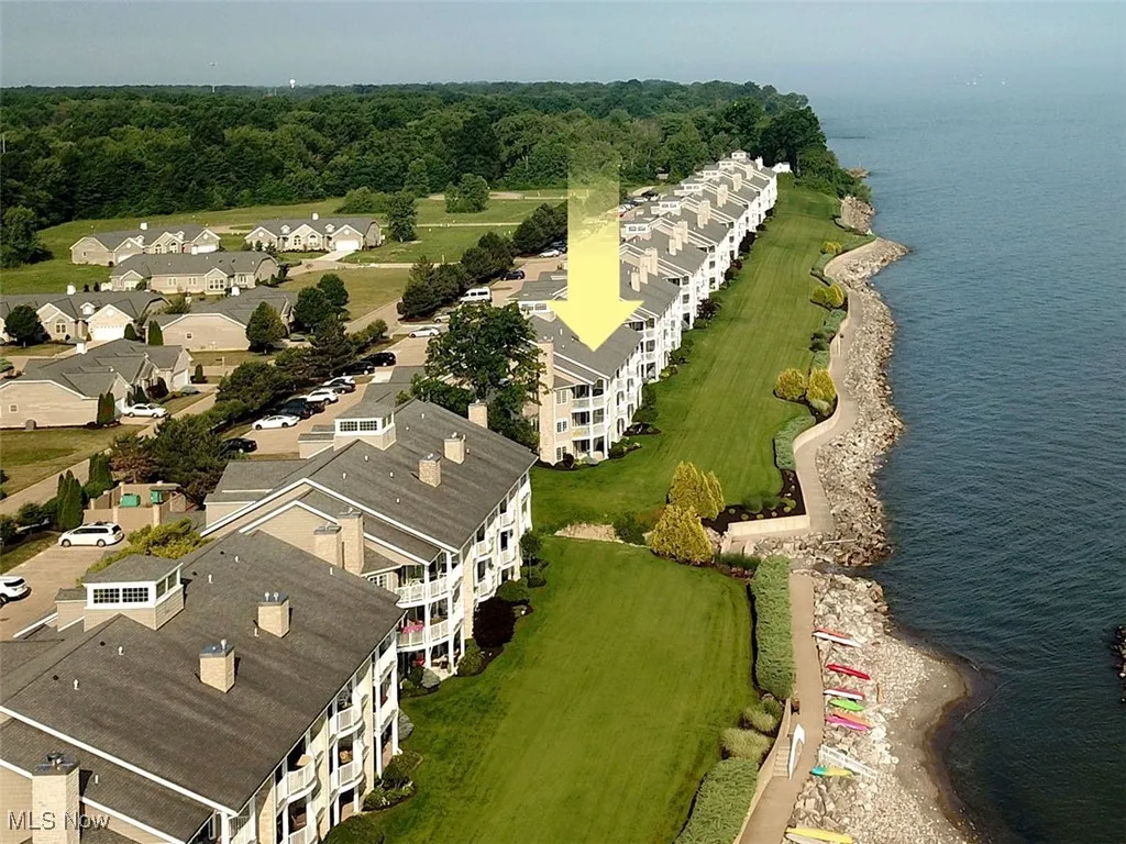 Aerial view of condo and shore of Lake Erie.