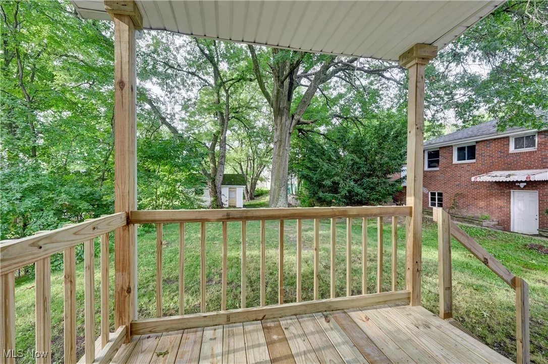 Wooden deck with a yard